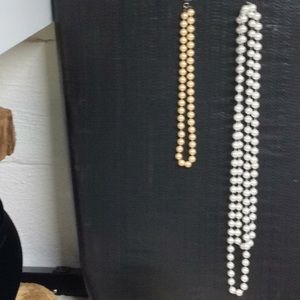 Two faux pearl necklaces